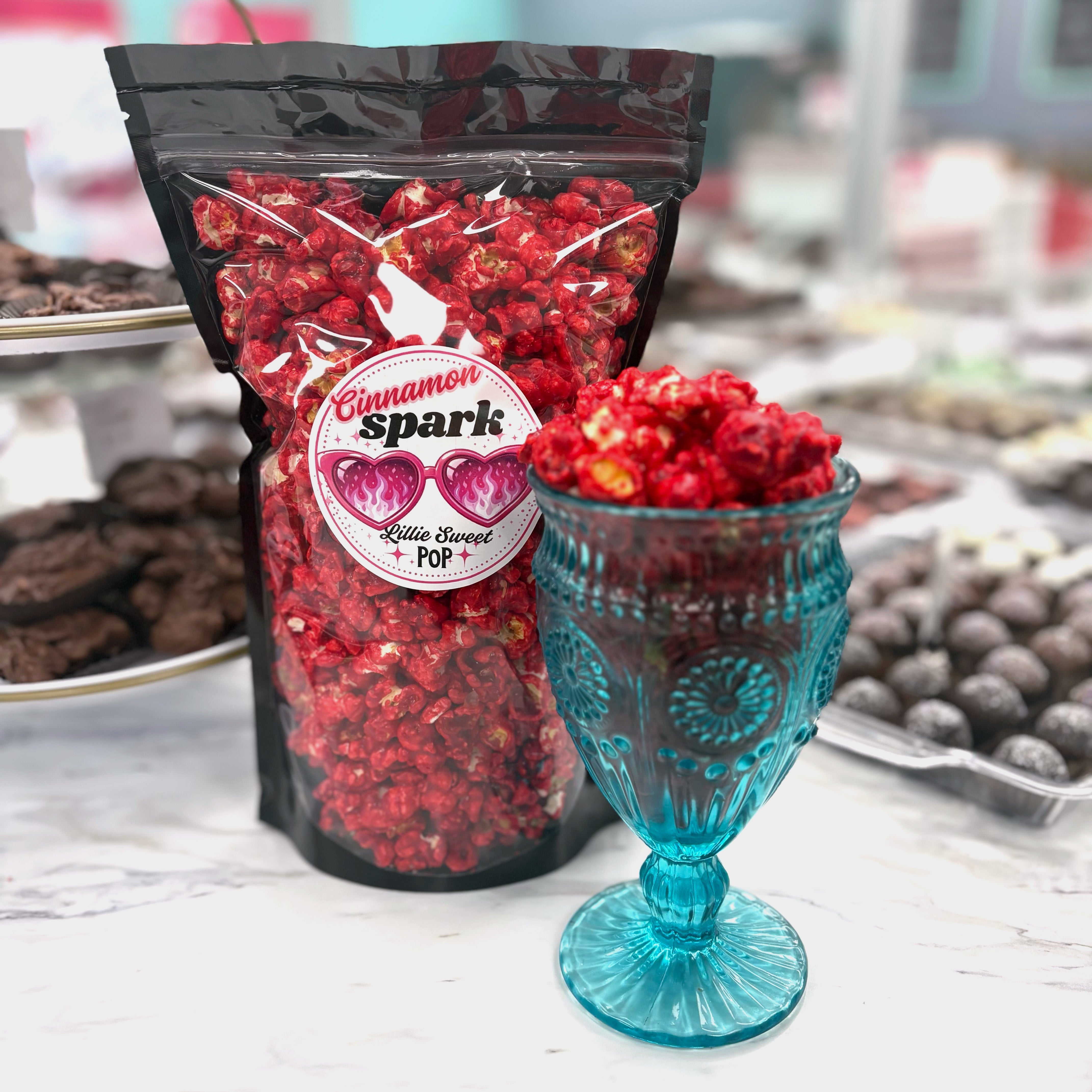 Our Cinnamon Spark Popcorn brings a warm, sweet cinnamon crunch to every bite.