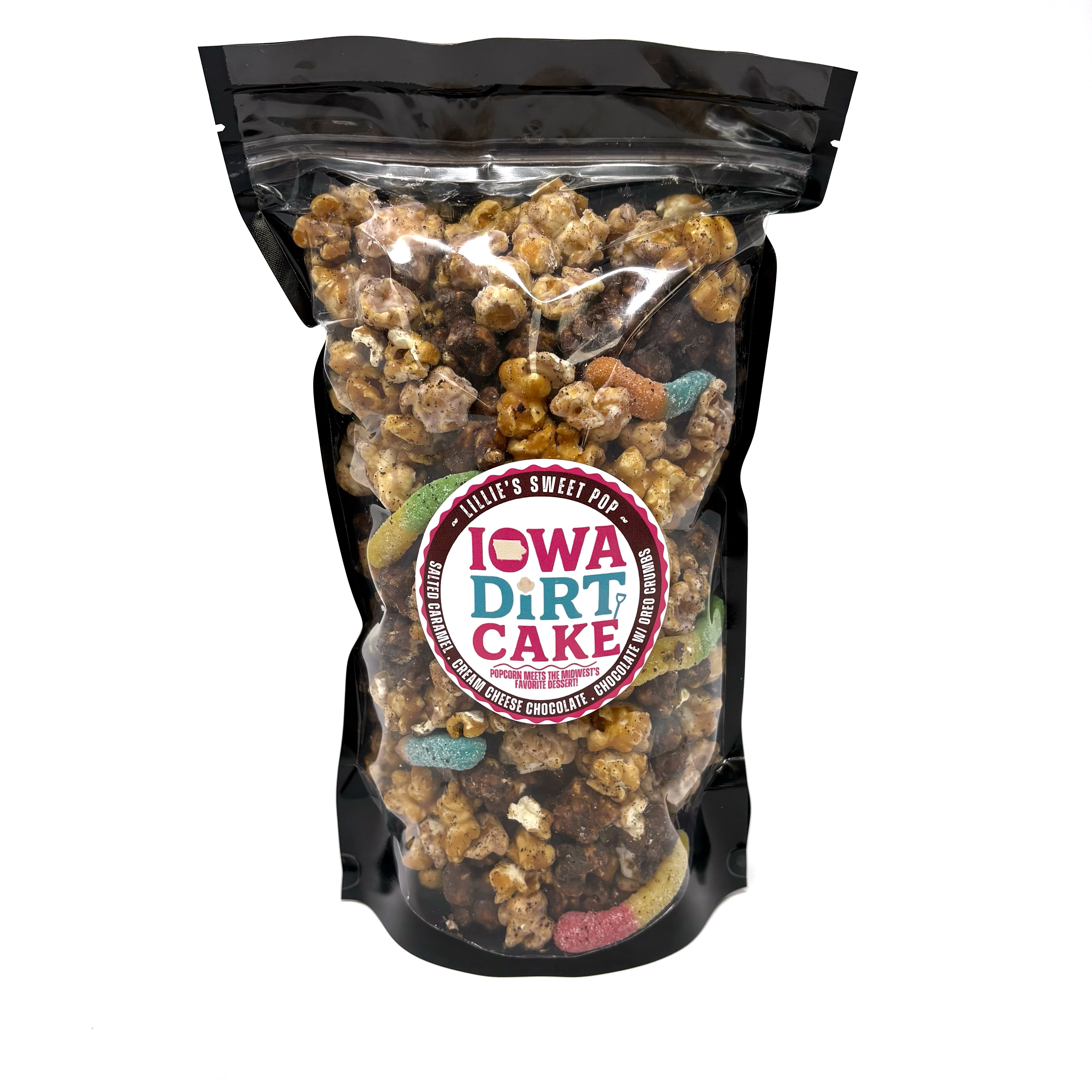 Our Iowa Dirt Cake Popcorn has our cream cheese chocolate popcorn, chocolate covered vanilla salted caramel popcorn, and our buttery vanilla salted caramel popcorn. All dusted in Oreo dust and sprinkled with a few gummy worms.